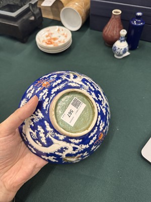 Lot 567 - FOUR CHINESE BLUE-GROUND 'DRAGON' BOWLS