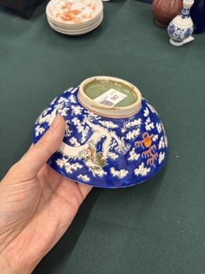 Lot 567 - FOUR CHINESE BLUE-GROUND 'DRAGON' BOWLS