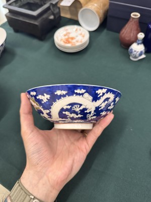 Lot 567 - FOUR CHINESE BLUE-GROUND 'DRAGON' BOWLS