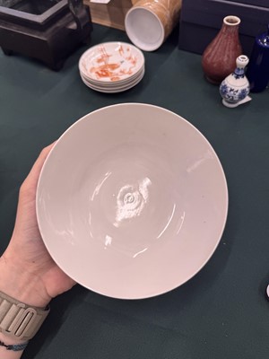 Lot 567 - FOUR CHINESE BLUE-GROUND 'DRAGON' BOWLS