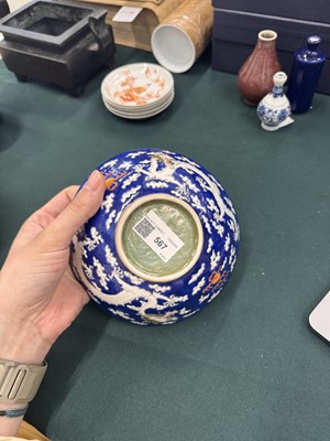 Lot 567 - FOUR CHINESE BLUE-GROUND 'DRAGON' BOWLS