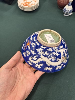 Lot 567 - FOUR CHINESE BLUE-GROUND 'DRAGON' BOWLS