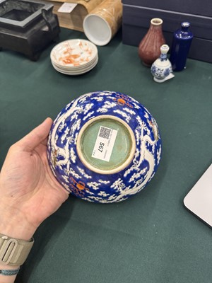 Lot 567 - FOUR CHINESE BLUE-GROUND 'DRAGON' BOWLS
