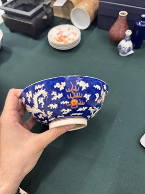 Lot 567 - FOUR CHINESE BLUE-GROUND 'DRAGON' BOWLS