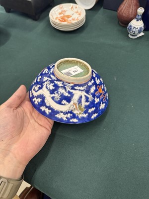 Lot 567 - FOUR CHINESE BLUE-GROUND 'DRAGON' BOWLS