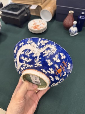 Lot 567 - FOUR CHINESE BLUE-GROUND 'DRAGON' BOWLS