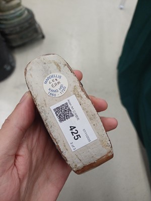 Lot 425 - Three Chinese biscuit famille-verte models of shoes, Qing dynasty, Kangxi period