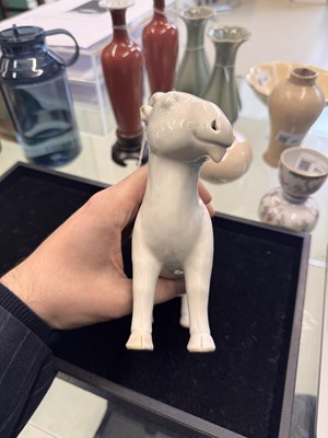 Lot 476 - A Chinese white-glazed figure of a ram, Qing dynasty, Qianlong period