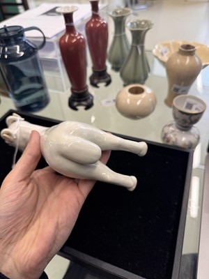 Lot 476 - A Chinese white-glazed figure of a ram, Qing dynasty, Qianlong period