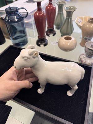 Lot 476 - A Chinese white-glazed figure of a ram, Qing dynasty, Qianlong period