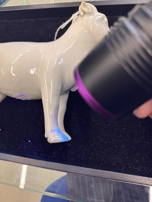 Lot 476 - A Chinese white-glazed figure of a ram, Qing dynasty, Qianlong period