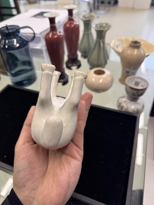 Lot 476 - A Chinese white-glazed figure of a ram, Qing dynasty, Qianlong period