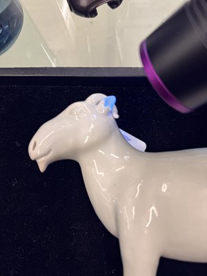 Lot 476 - A Chinese white-glazed figure of a ram, Qing dynasty, Qianlong period