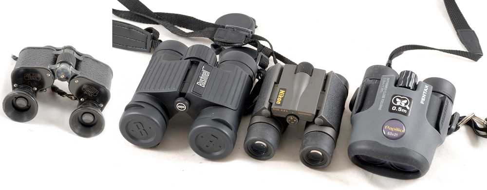 Lot 437 - Bushnell & Other Compact & Folding Binoculars.