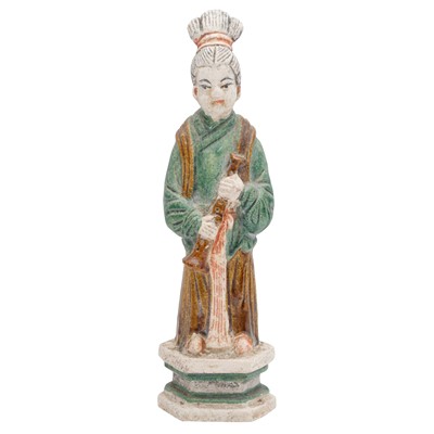 Lot 667 - A Chinese sancai-glazed figure of a lady, Ming dynasty
