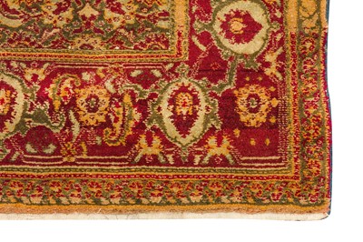 Lot 22 - AN ANTIQUE AGRA RUG, NORTH INDIA
