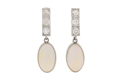 Lot 37 - A pair of moonstone and diamond pendent earrings