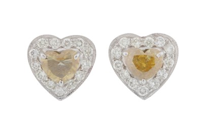 Lot 146 - A pair of yellow and white diamond heart earrings