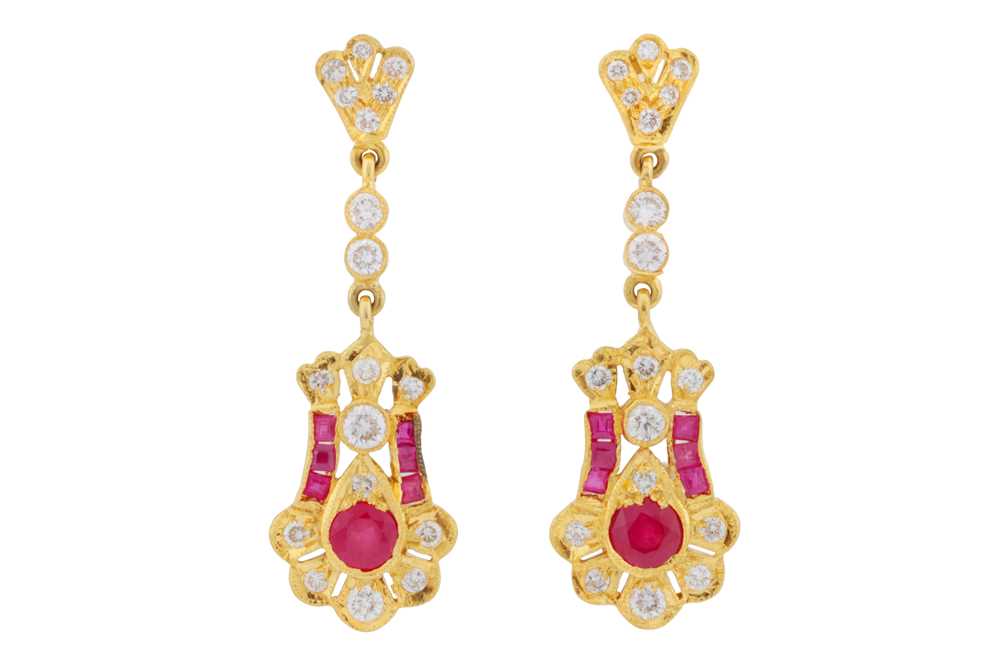 Lot 125 - A pair of ruby and diamond pendent earrings