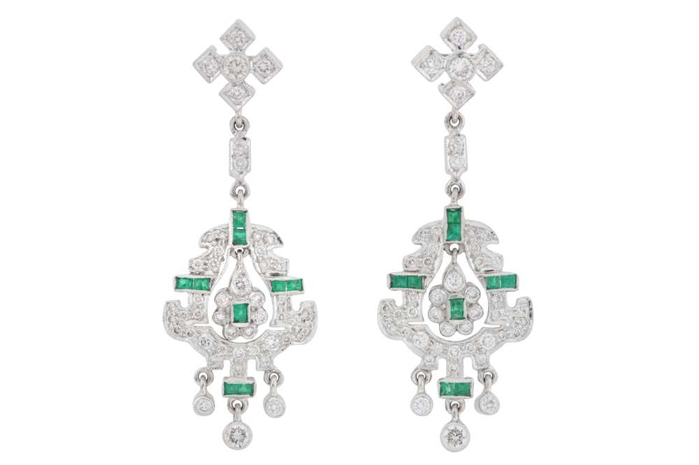 Lot 24 - A pair of emerald and diamond pendent earrings
