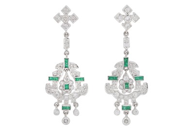 Lot 24 - A pair of emerald and diamond pendent earrings