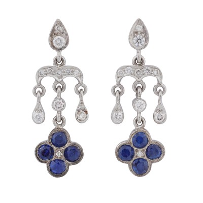 Lot 27 - A pair of sapphire and diamond flower pendant earrings