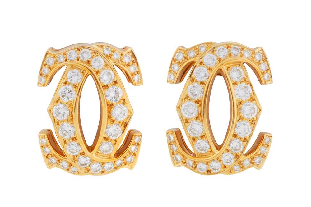 309 - Cartier Ι A pair of 'C de Cartier' diamond earrings