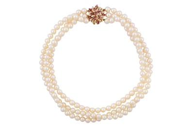 Lot 118 - A three-strand pearl choker necklace, circa 1982