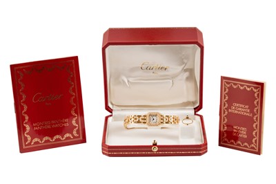 Lot 436 - Lady's Cartier 18k gold and Diamond-Set Bracelet Watch
