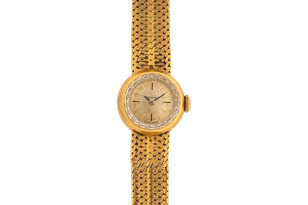 Lot 449 - Lady's Omega 18k Gold Bracelet Watch