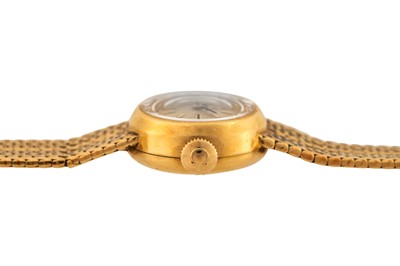 Lot 449 - Lady's Omega 18k Gold Bracelet Watch