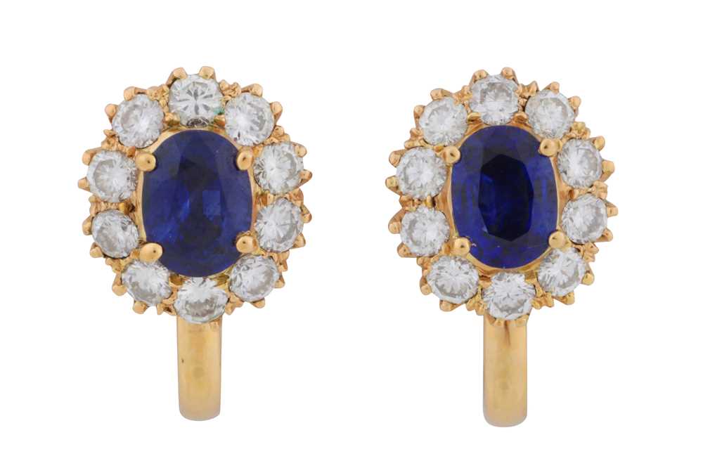 Lot 54 - A pair of sapphire and diamond cluster earrings