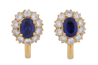 Lot 54 - A pair of sapphire and diamond cluster earrings