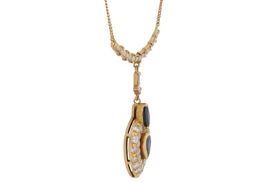 Lot 80 - A sapphire and diamond pendant necklace, circa 1987