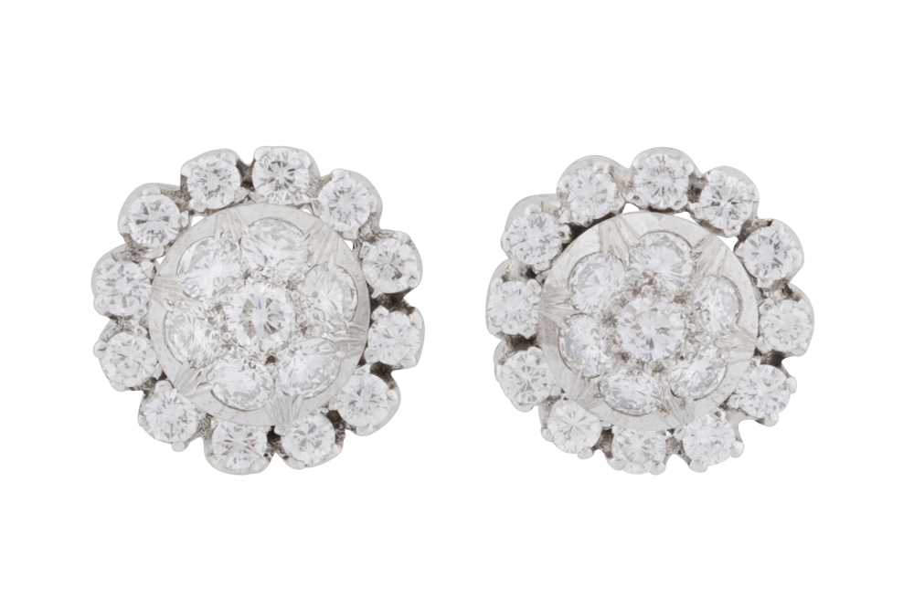 Lot 201 - A pair of diamond stud earrings