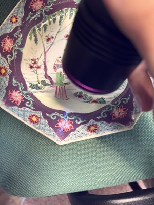 Lot 52 - A pair of fine Chinese export octagonal 'lady and child' dishes, Qing dynasty, Yongzheng period