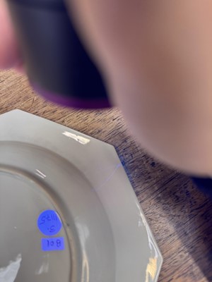 Lot 52 - A pair of fine Chinese export octagonal 'lady and child' dishes, Qing dynasty, Yongzheng period