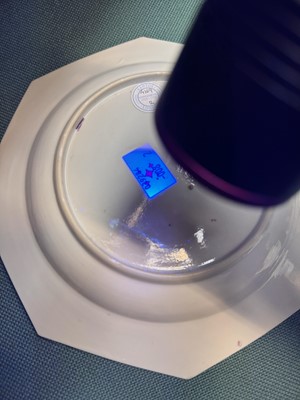 Lot 52 - A pair of fine Chinese export octagonal 'lady and child' dishes, Qing dynasty, Yongzheng period