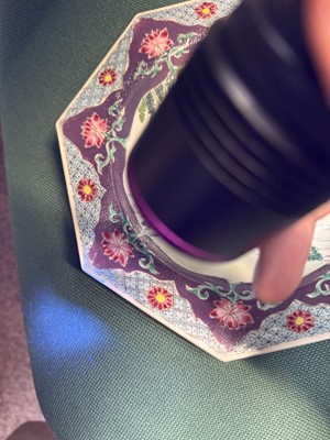 Lot 52 - A pair of fine Chinese export octagonal 'lady and child' dishes, Qing dynasty, Yongzheng period