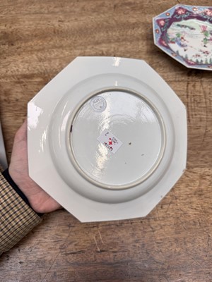 Lot 52 - A pair of fine Chinese export octagonal 'lady and child' dishes, Qing dynasty, Yongzheng period