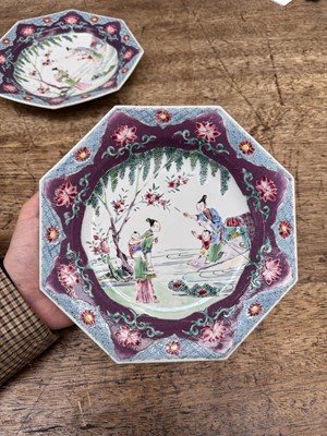 Lot 52 - A pair of fine Chinese export octagonal 'lady and child' dishes, Qing dynasty, Yongzheng period