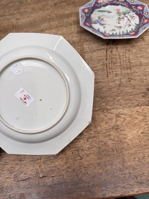 Lot 52 - A pair of fine Chinese export octagonal 'lady and child' dishes, Qing dynasty, Yongzheng period