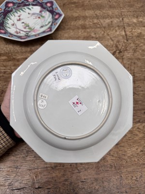 Lot 52 - A pair of fine Chinese export octagonal 'lady and child' dishes, Qing dynasty, Yongzheng period