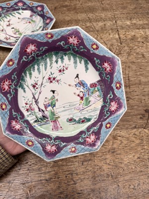 Lot 52 - A pair of fine Chinese export octagonal 'lady and child' dishes, Qing dynasty, Yongzheng period