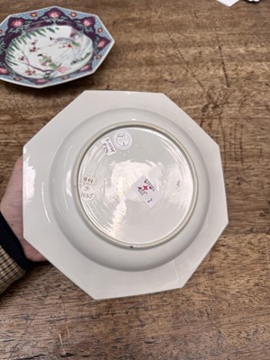Lot 52 - A pair of fine Chinese export octagonal 'lady and child' dishes, Qing dynasty, Yongzheng period