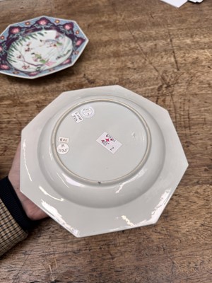 Lot 52 - A pair of fine Chinese export octagonal 'lady and child' dishes, Qing dynasty, Yongzheng period