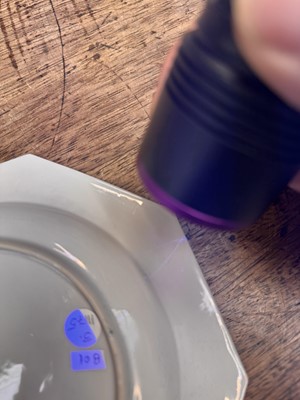 Lot 52 - A pair of fine Chinese export octagonal 'lady and child' dishes, Qing dynasty, Yongzheng period