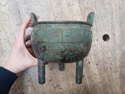 Lot 26 - A CHINESE ARCHAIC BRONZE RITUAL FOOD VESSEL, DING