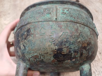Lot 26 - A CHINESE ARCHAIC BRONZE RITUAL FOOD VESSEL, DING