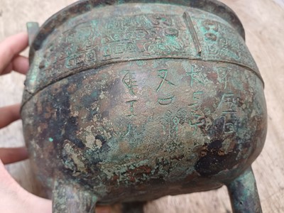 Lot 26 - A CHINESE ARCHAIC BRONZE RITUAL FOOD VESSEL, DING